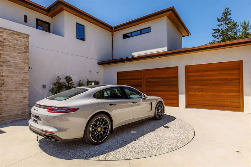 Concrete surface car turntable integration for driveway